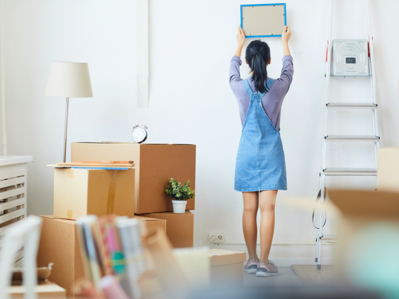 woman unpacking during her move-in
