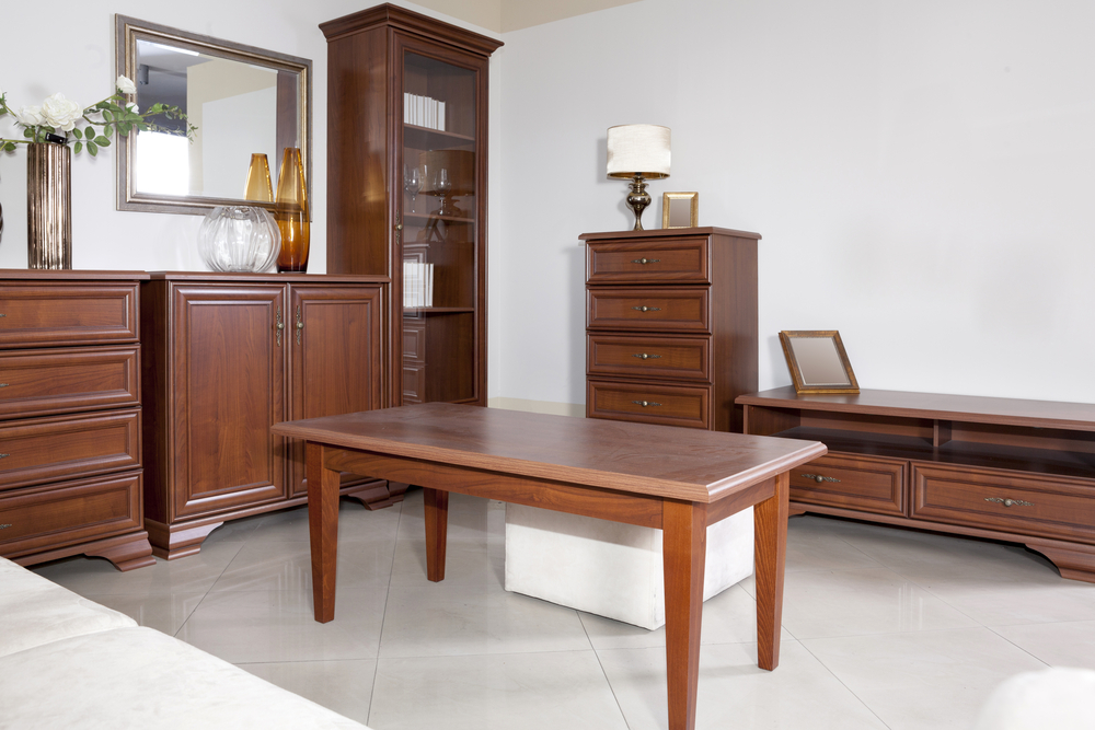 Wooden furniture in an empty room.