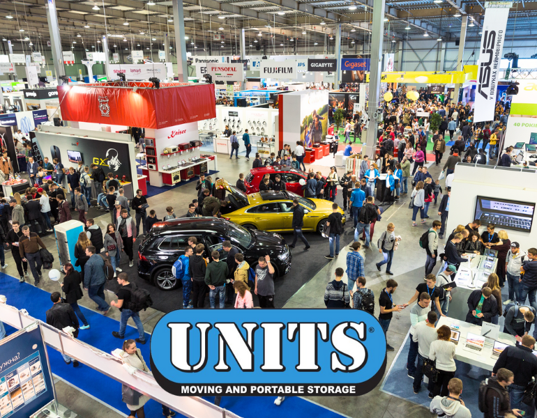 a pic of busy convention center and units logo