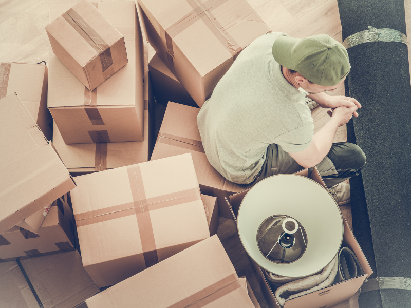 man in the middle of Out-of-State Moving