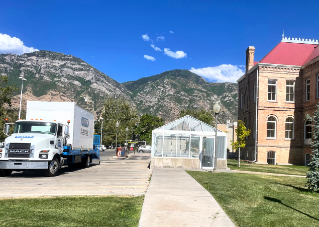 Units Of Utah truck parked in front of a building.